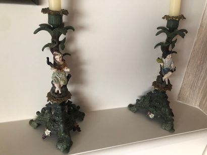 Pair of candlesticks in painted sheet metal...