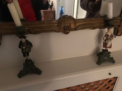 Pair of polychrome candlesticks representing...