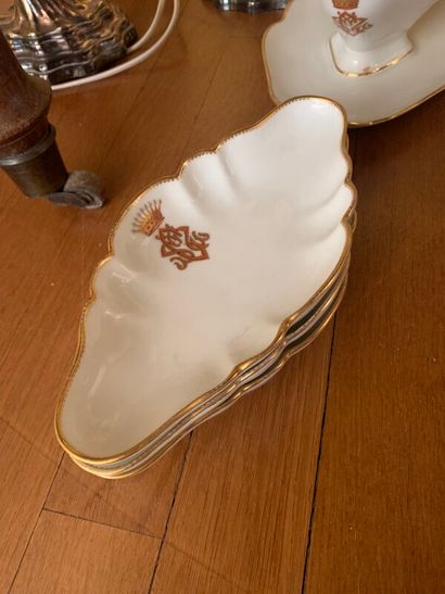 Part of service in white porcelain, gold...