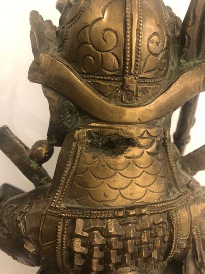 Personnage asiatique en bronze doré

H. 25...