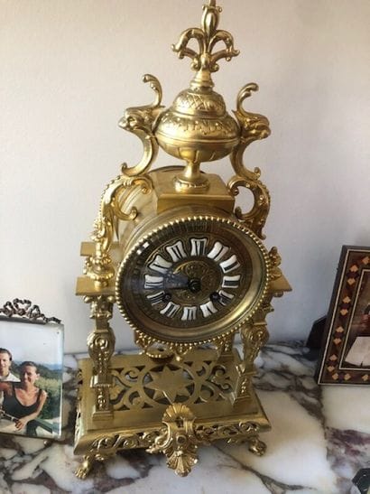 Mantelpiece clock in bronze, the enamelled...