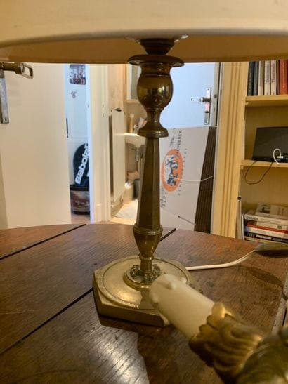 A pair of wall lamps of rocaille style in...