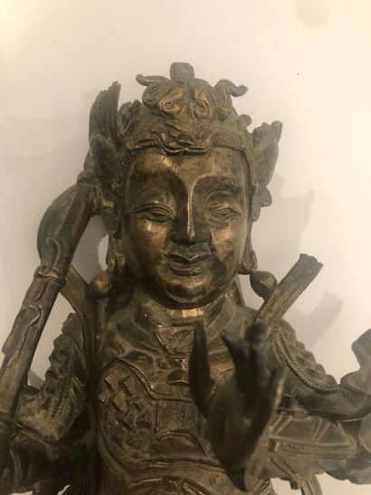 Personnage asiatique en bronze doré

H. 25...