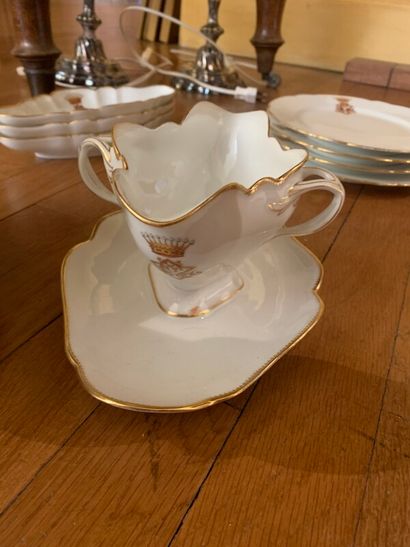 Part of service in white porcelain, gold...