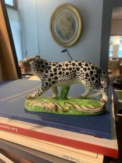 A porcelain figurine representing a pant...
