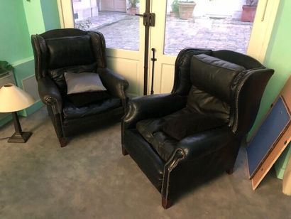 *Paire de fauteuils confortables en cuir...