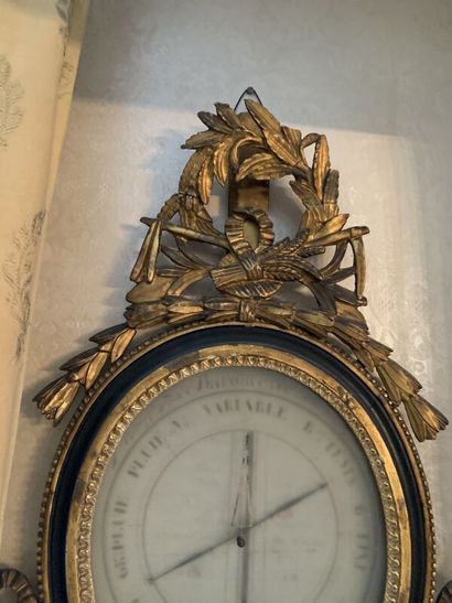 Louis XVI style gilded and blackened carved...