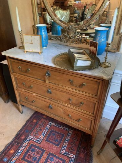 Chest of drawers in light wood and brass...