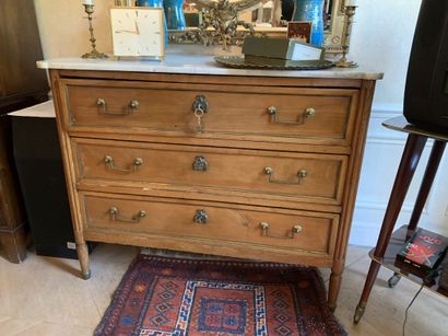 Chest of drawers in light wood and brass...