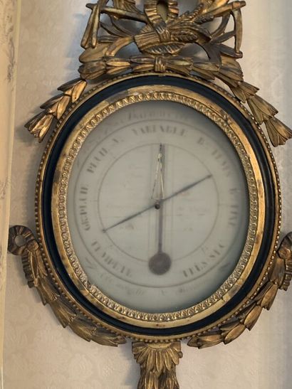 Louis XVI style gilded and blackened carved...
