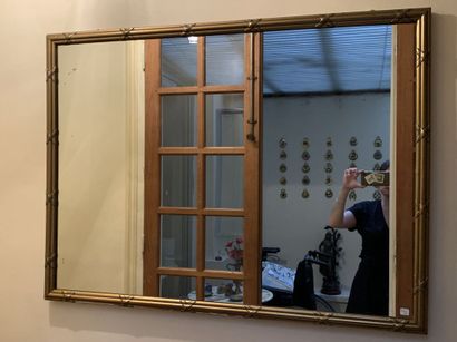 Rectangular gilded wood mirror. 87 x 116...