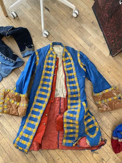 A set of three costumes. 
(accidents, tears,...