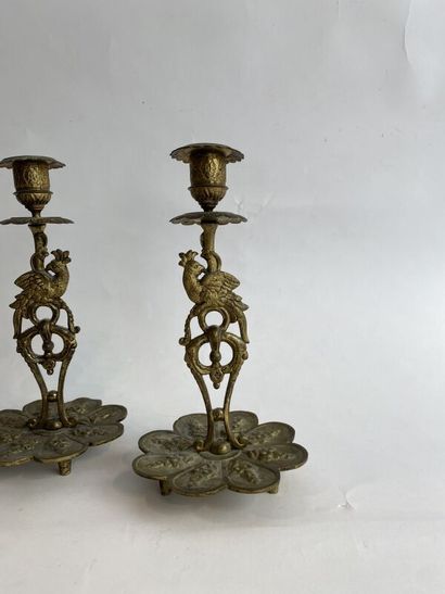 Gilt bronze clock and pair of candlesticks,...