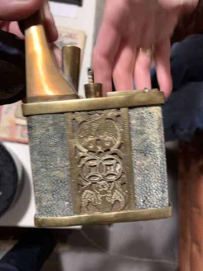 A gilt brass and stingray lighter. A zoomorphic...