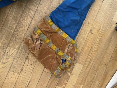 A set of three costumes. 
(accidents, tears,...
