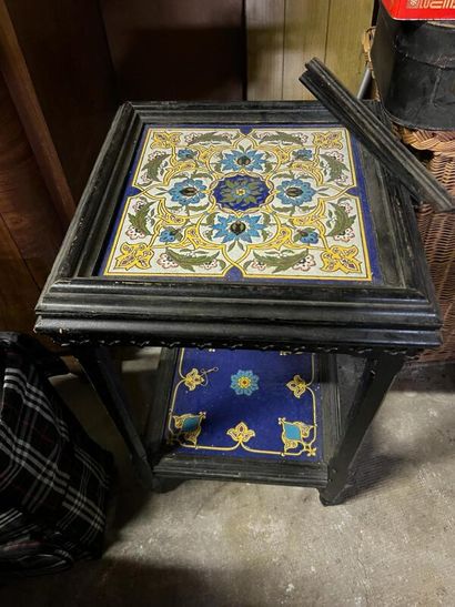A blackened and turned wooden pedestal table...