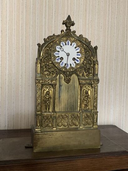 Neo-Gothic gilt bronze and repoussé clock....