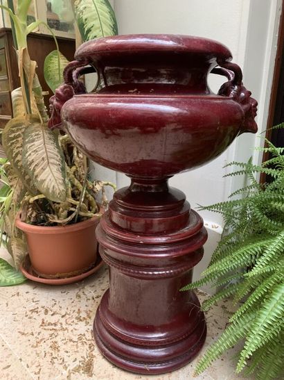 Red earthenware planter on base, handle with...