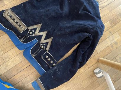 A set of three costumes. 
(accidents, tears,...