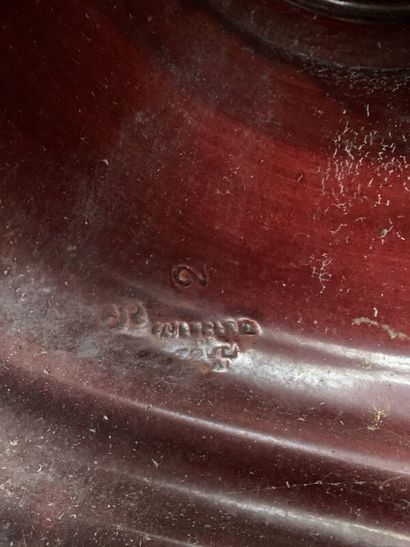 Red earthenware planter on base, handle with...
