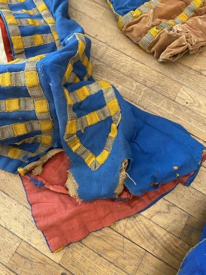 A set of three costumes. 
(accidents, tears,...