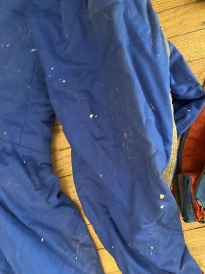 A set of three costumes. 
(accidents, tears,...