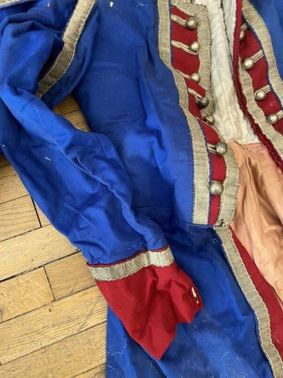 A set of three costumes. 
(accidents, tears,...