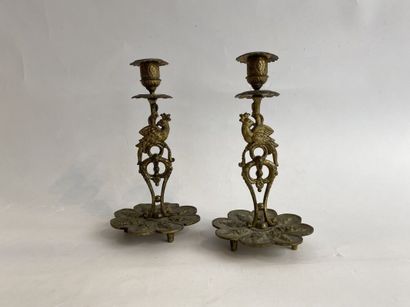 Gilt bronze clock and pair of candlesticks,...