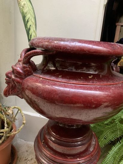 Red earthenware planter on base, handle with...