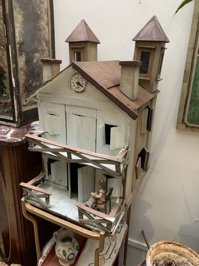 A painted wooden doll's house. 
Height: 52...