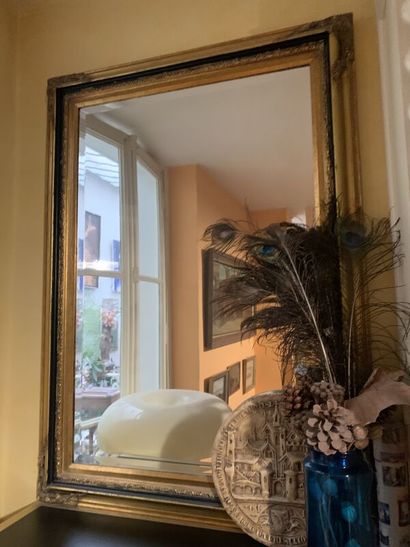 Pair of giltwood mirrors with black highlights,...