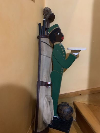 Small painted wooden mute servant representing...