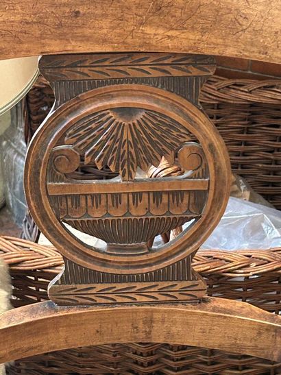 Rustic straw-covered armchair in natural...