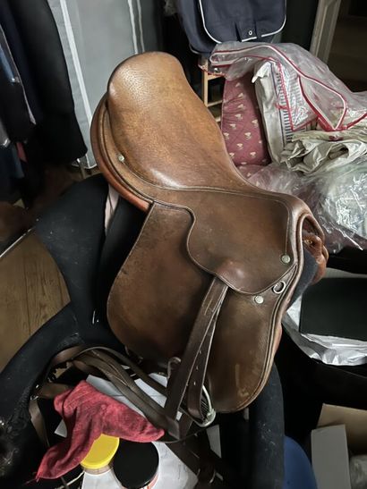 Tan leather saddle + stirrups
HERMÈS AND...