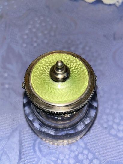 Two silver inkwells 
One on a marble base...