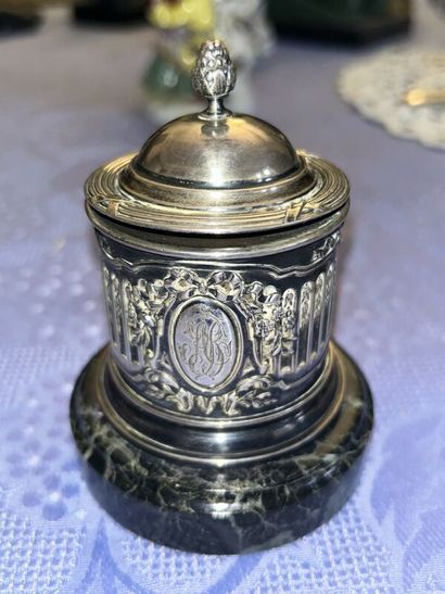 Two silver inkwells 
One on a marble base...