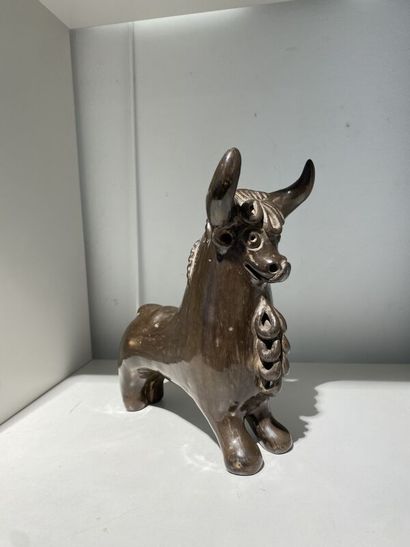 Stylized bull in stained wood
H.20cm