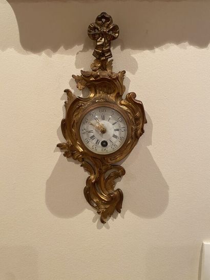 Small carriage clock in rocaille style
H...