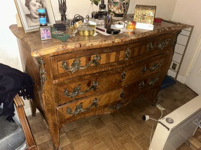 Large veneered chest of drawers opening to...