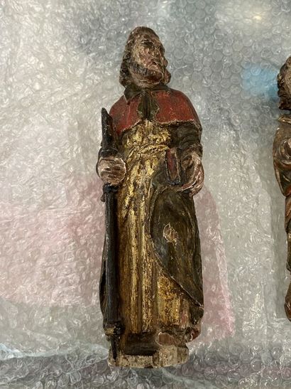 Two statuettes of saints in carved, polychromed...