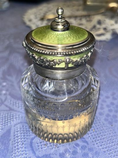 Two silver inkwells 
One on a marble base...