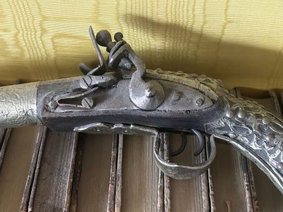 Large wooden flintlock pistol, silver ? And...