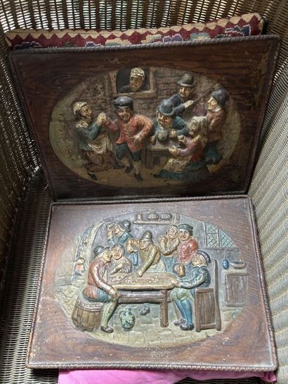 Two painted sheet metal plaques in relief
Tavern...