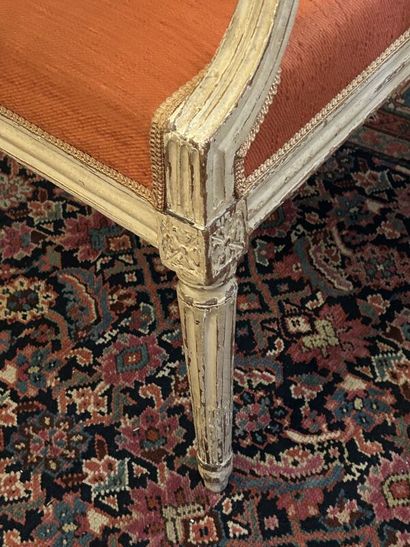 Pair of flat-back armchairs in cream relacquered...