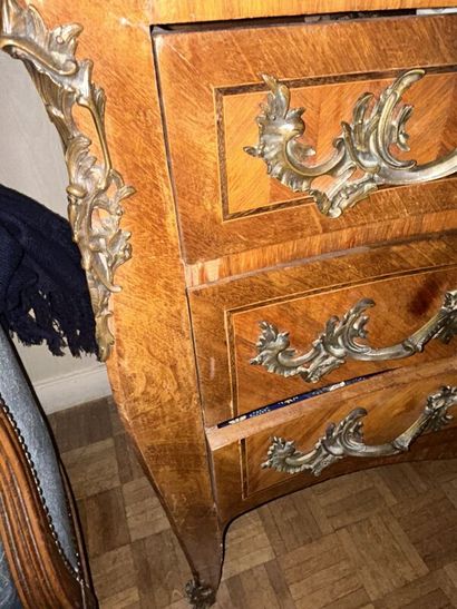 Large veneered chest of drawers opening to...