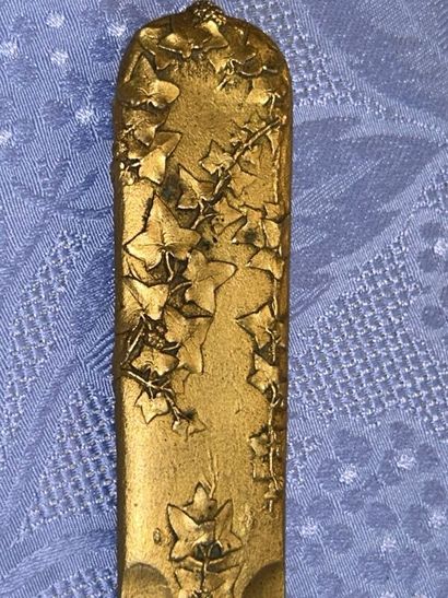 Bronze paper cup with ivy decoration
Art...