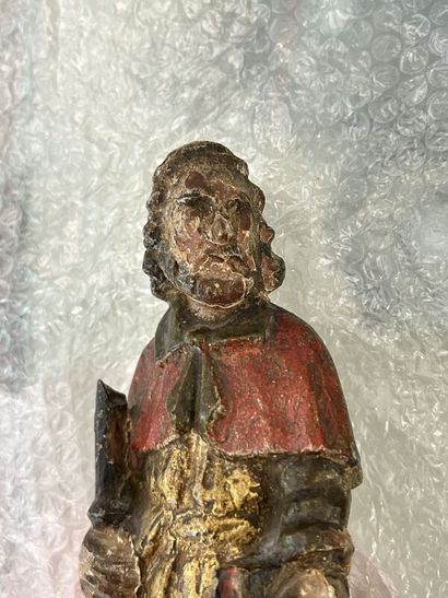 Two statuettes of saints in carved, polychromed...