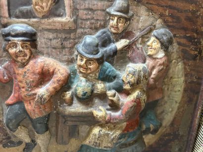 Two painted sheet metal plaques in relief
Tavern...