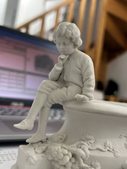 Small cookie jardinière featuring a pensive...