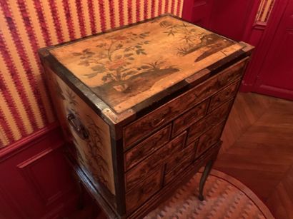 A softwood CABINET decorated on all sides...